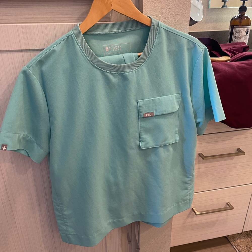Figs aqua blue scrubs.
